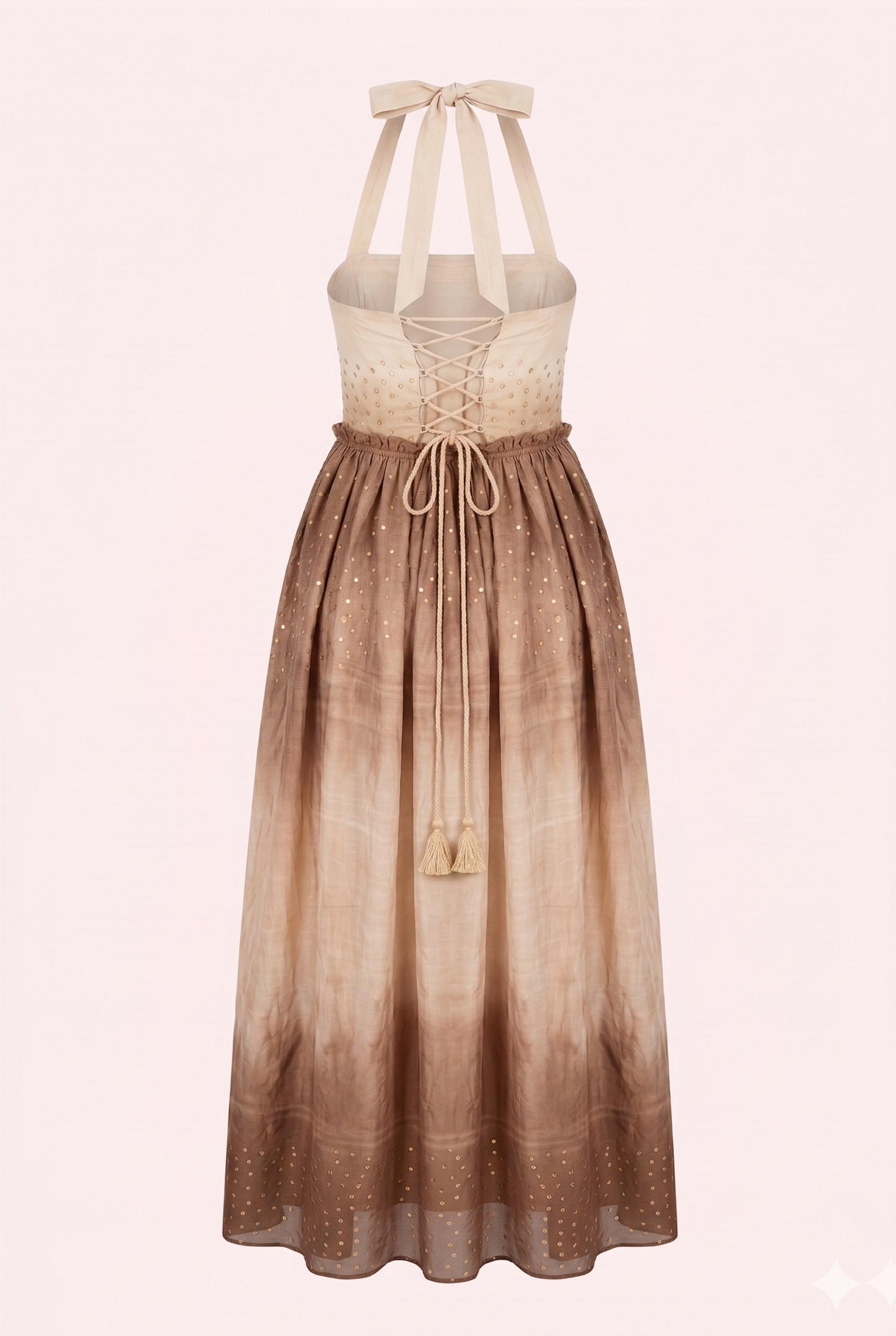 Aarohi Dress in handwoven mulberry silk featuring ivory-to-mocha Shibori dyeing, hand-sewn brass sequins, embroidered bodice, halter tie straps, and a flowing floor-length silhouette.