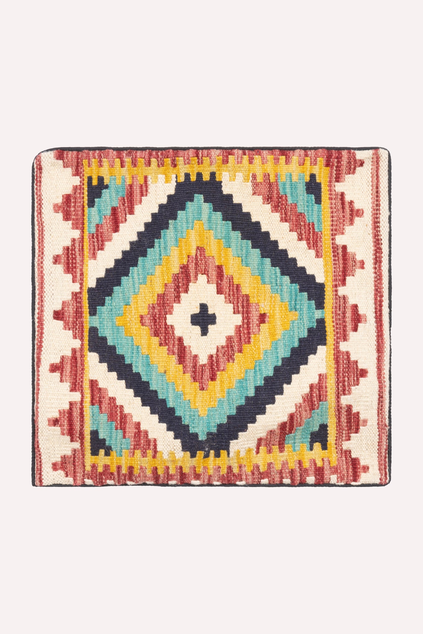 One-of-a-kind handwoven tribal kilim cushion cover, 44 × 42 cm, featuring traditional artisan weaving, subtle signs of age, and rich cultural heritage, curated by ZAZI.
