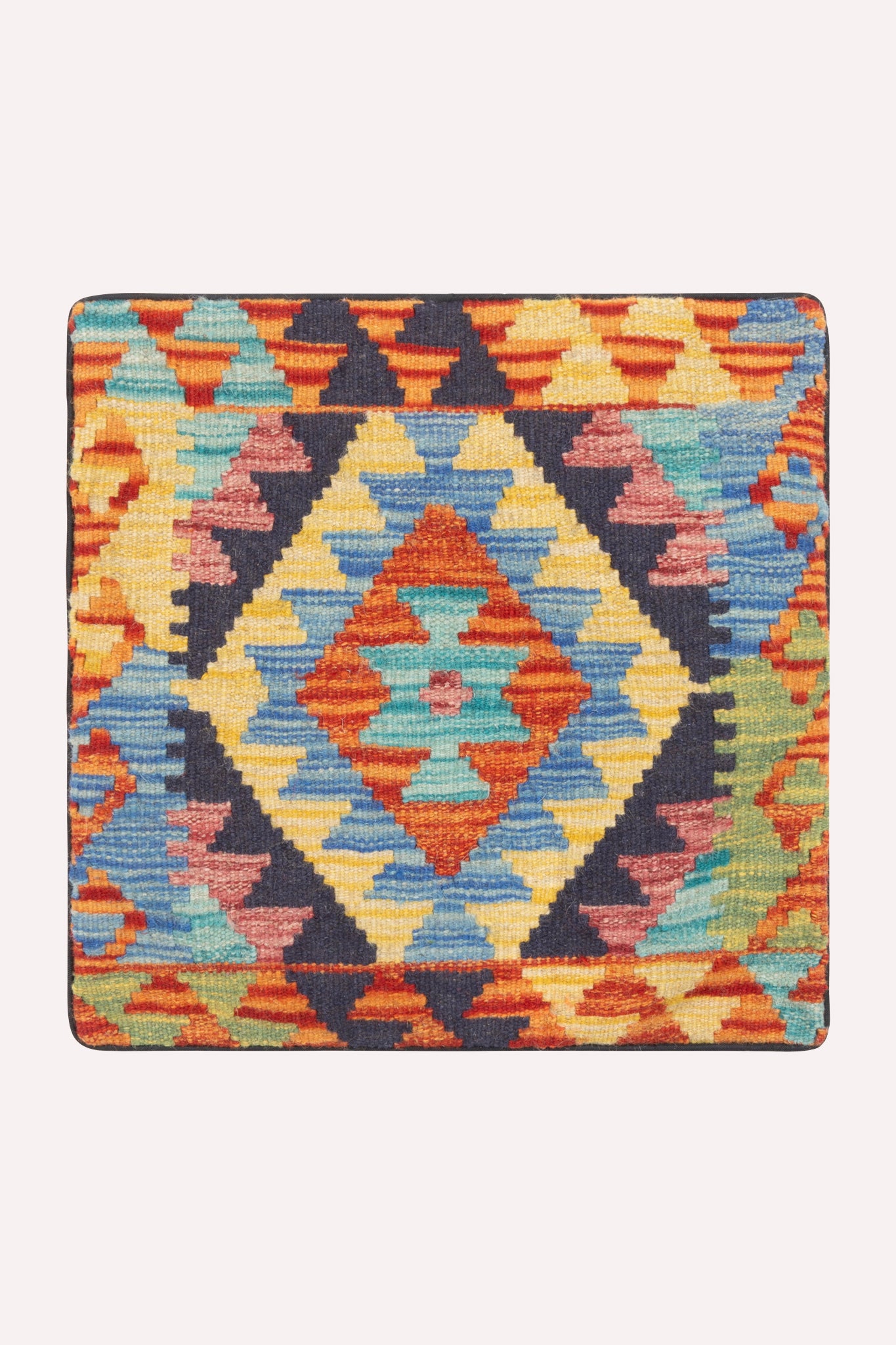 One-of-a-kind handwoven tribal kilim cushion cover, 46 × 46 cm, featuring traditional artisan weaving, subtle signs of age, and rich cultural heritage, curated by ZAZI.