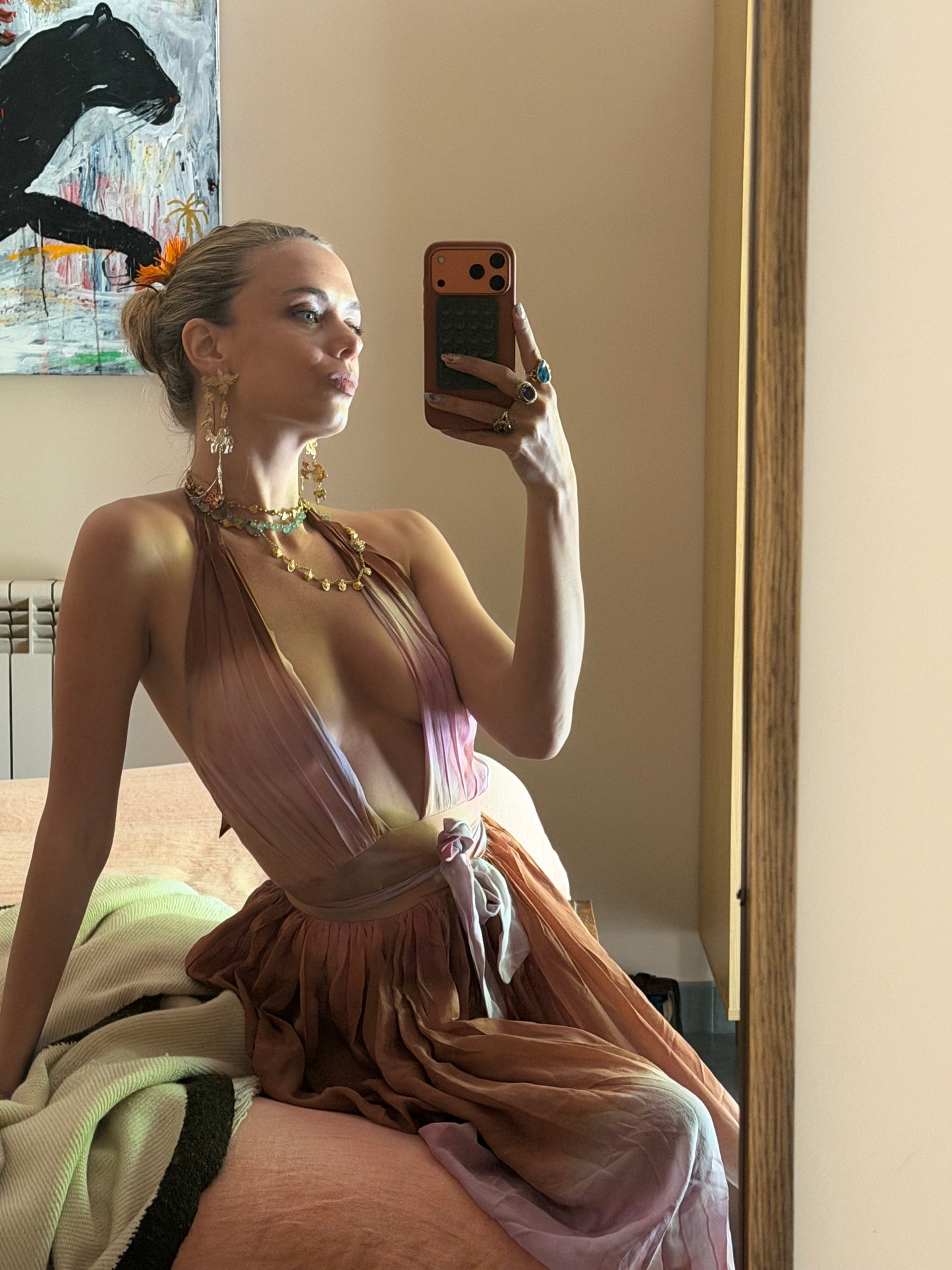 
                  
                    ZAZI Holiya hand-dyed maxi dress with halter neckline, flowing silhouette, and sunset-inspired watercolor hues, handcrafted in India by Heenaagrima artisans.
                  
                