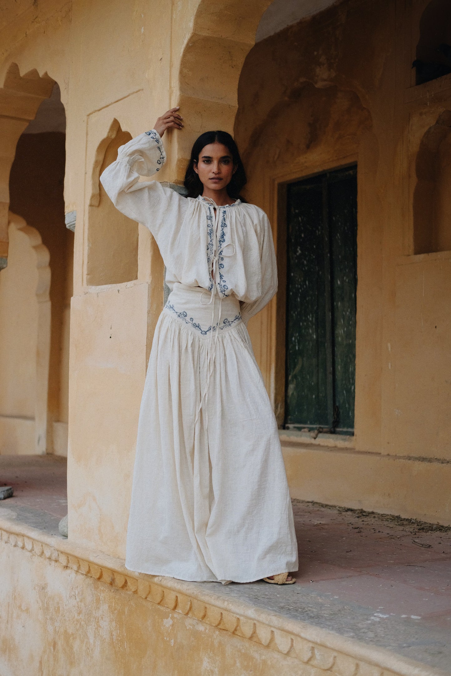 ZAZI Kalini handwoven Khadi cotton two-piece set with embroidered blouse, balloon sleeves, adjustable ties, and flowing maxi skirt for summer and resort wear.