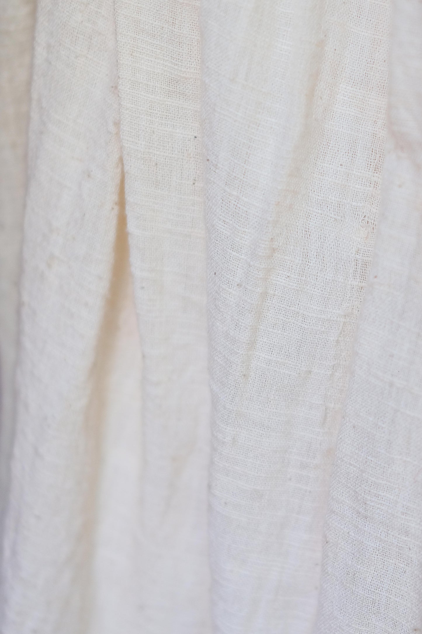 
                  
                    ZAZI Kalini handwoven Khadi cotton two-piece set with embroidered blouse, balloon sleeves, adjustable ties, and flowing maxi skirt for summer and resort wear.
                  
                