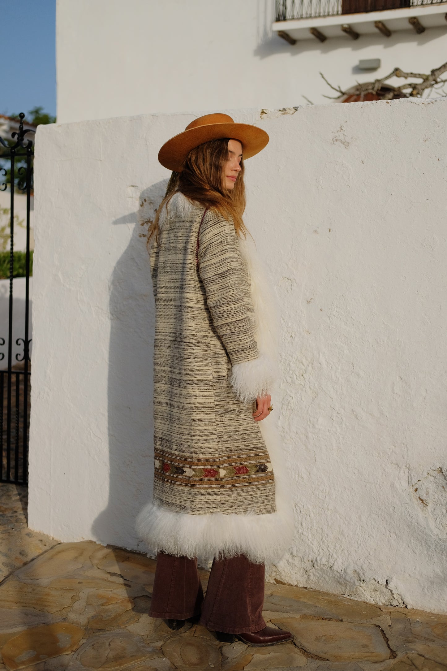 Handmade winter coat crafted from 100% pure Himalayan wool by Kullvi Whims artisans in India.
