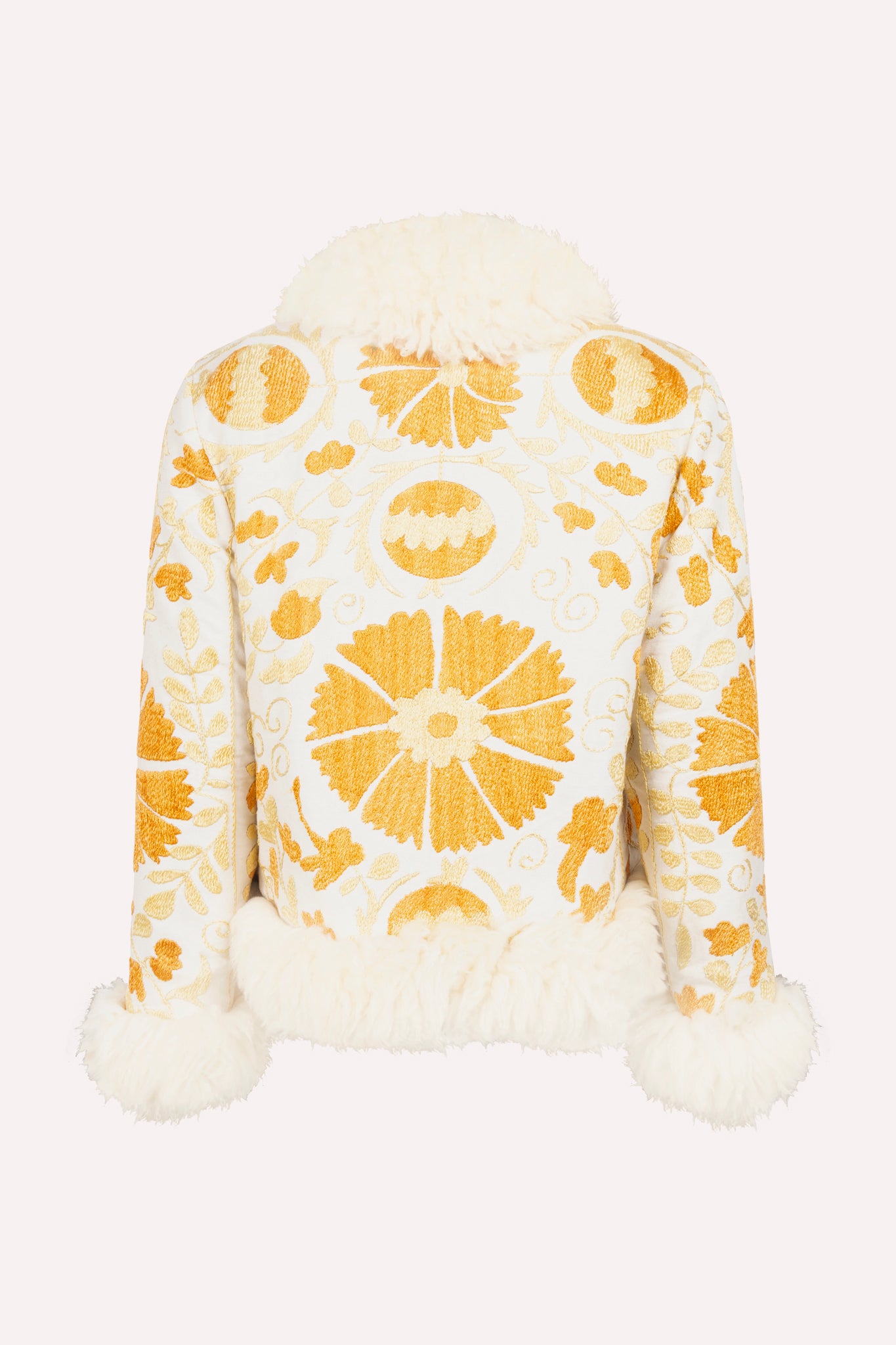 Handcrafted ZAZI Afghan short straight coat made from hand-embroidered vintage cotton suzani, inspired by a 70s Penny Lane silhouette, featuring hook closure, colorful floral patterns, and up-cycled sheepskin lining.