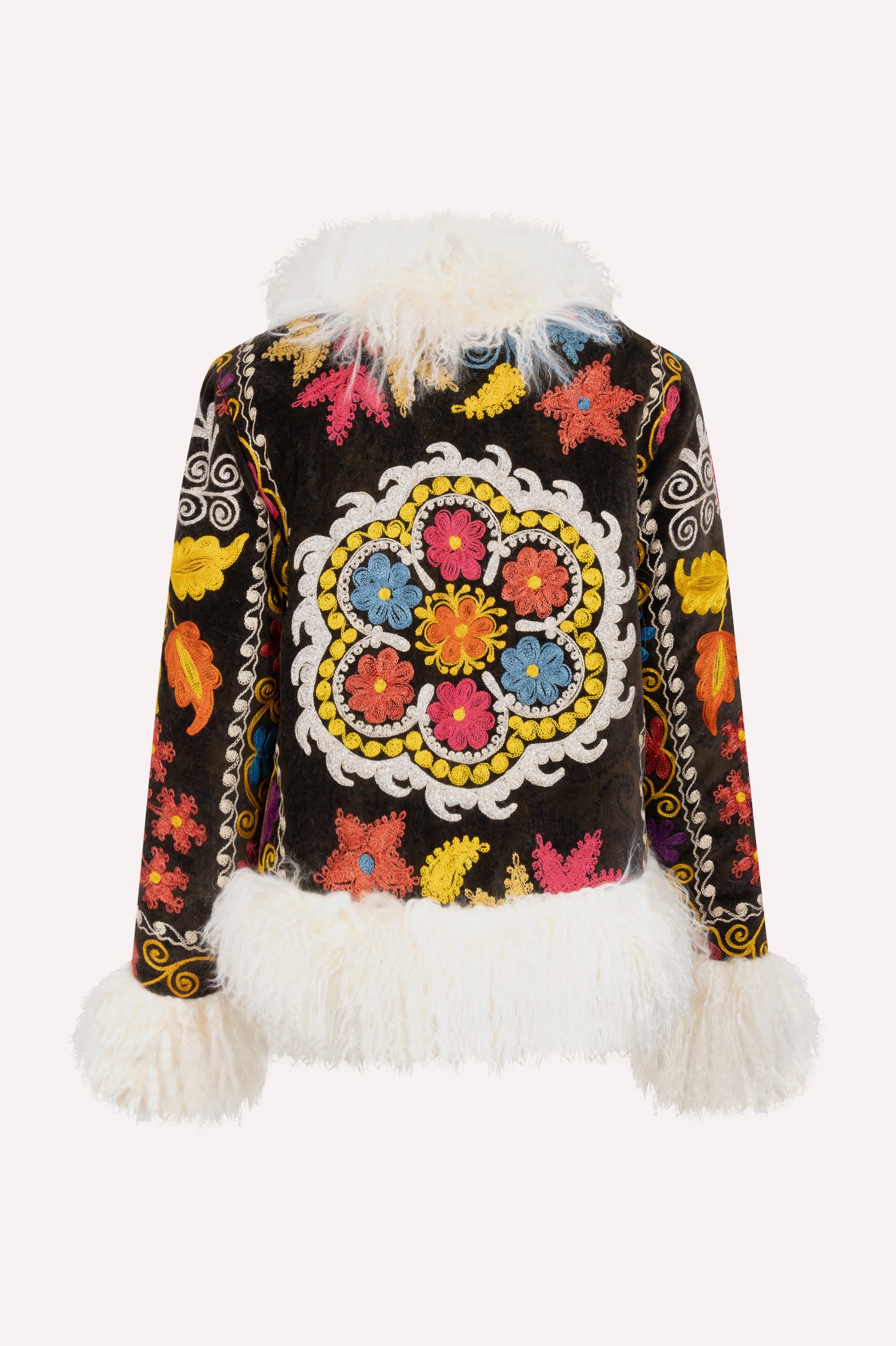 Short ZAZI Afghan coat handcrafted from vintage velours cotton suzani embroidery with upcycled sheepskin lining, featuring a straight 1970s-inspired silhouette with hook closures, made by women artisans in Afghanistan.