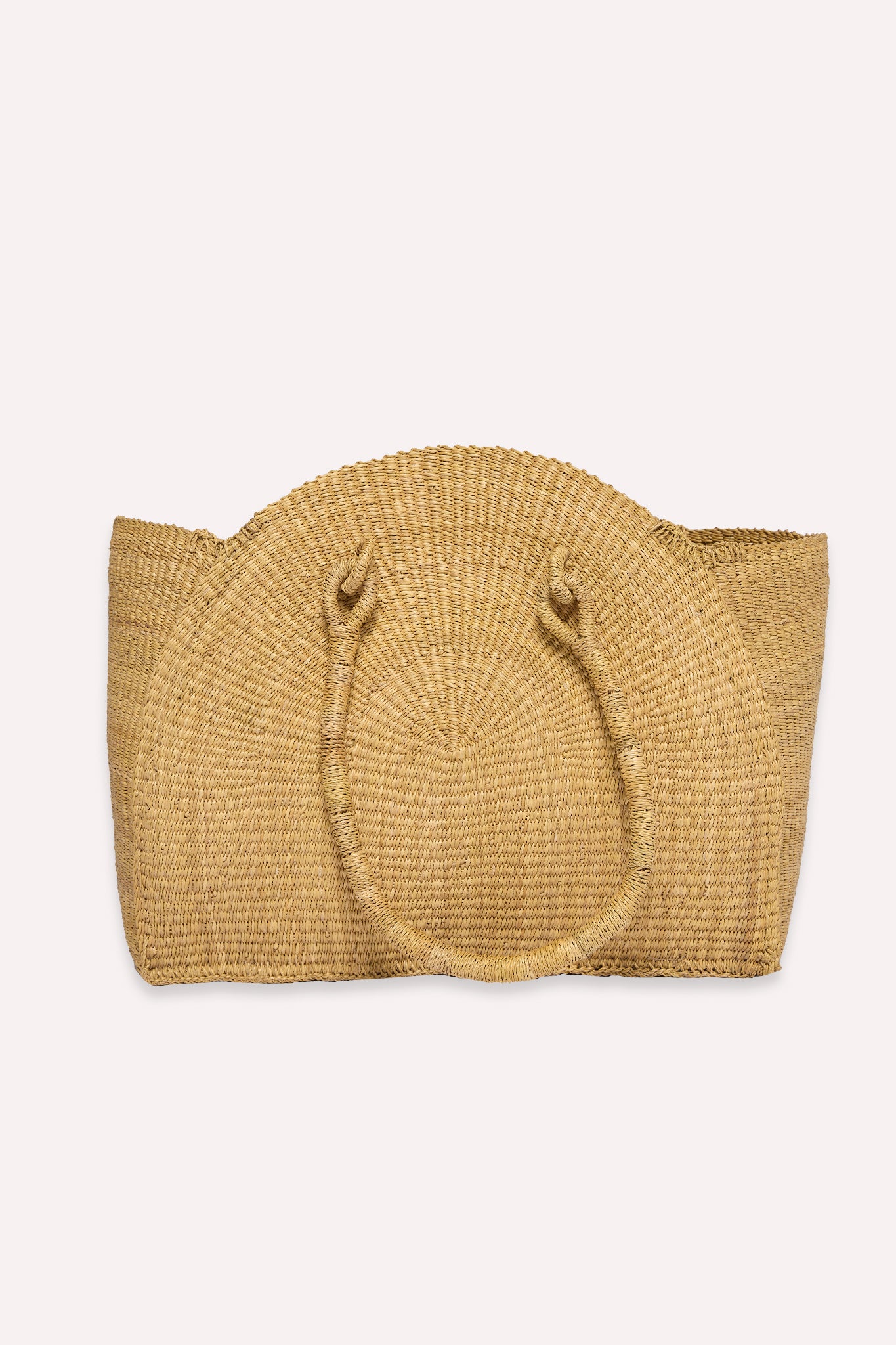 Handmade ZAZI x Dorcas large tote bag with half-moon shape, woven from natural Veta Vera grass in the signature ZAZI pattern by ASIGE women in Bolgatanga, Ghana