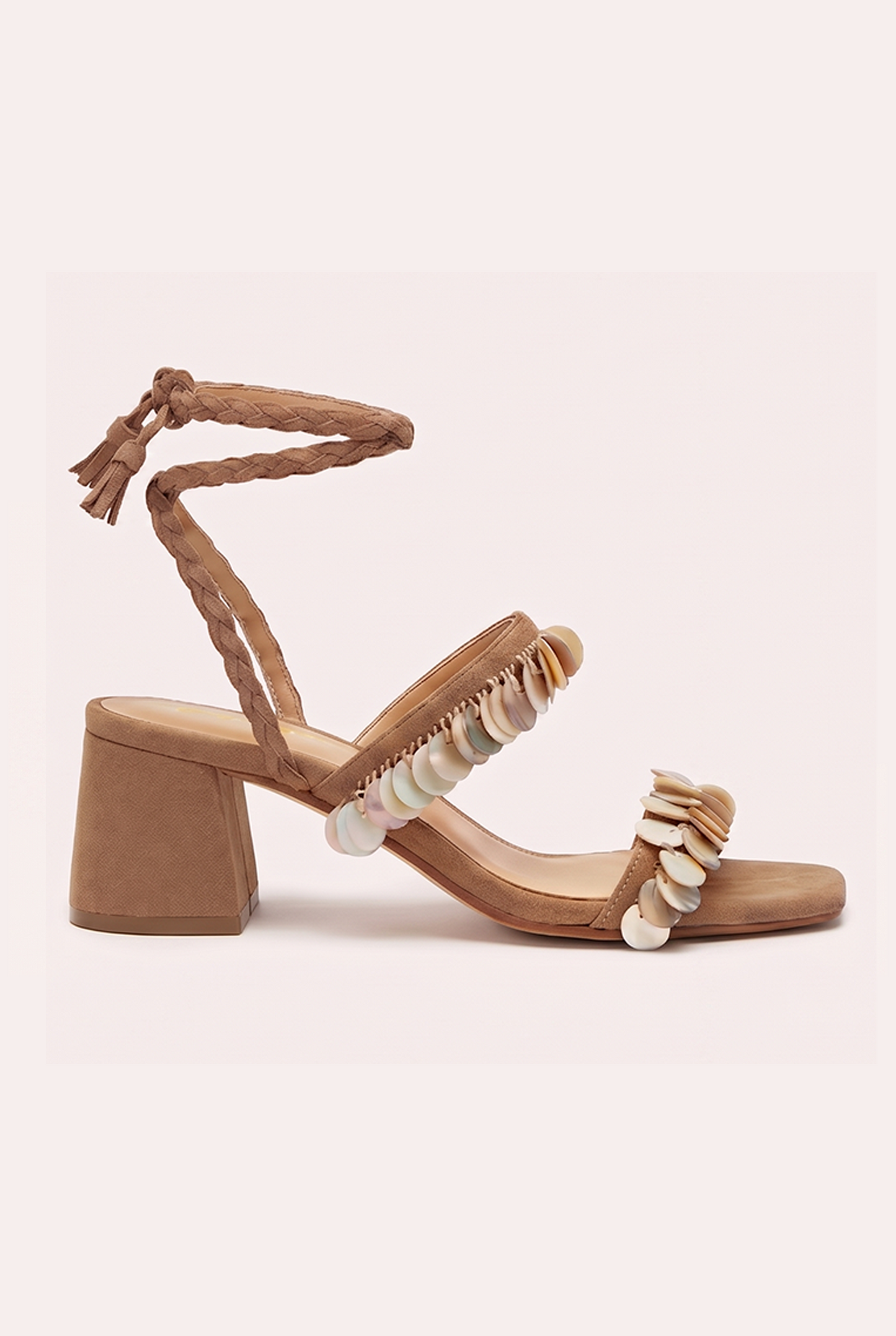 Handcrafted tan suede heel sandals with mother of pearl beads and braided wrap-around ankle ties.