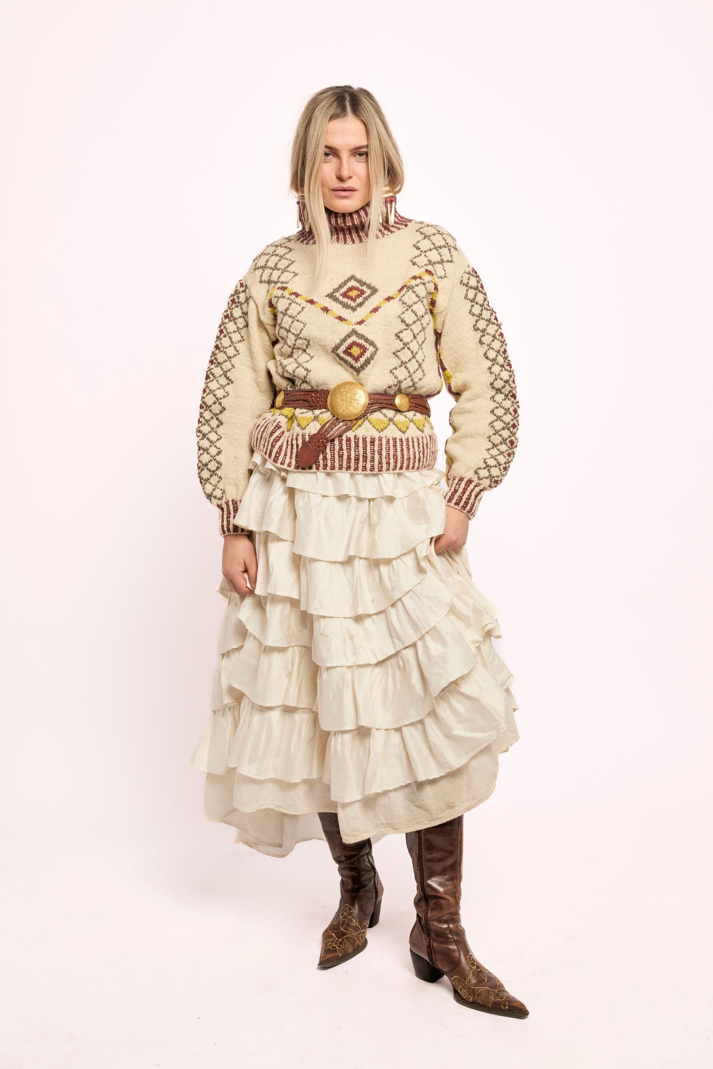 
                  
                    Handcrafted Himalayan wool jumper with puffed sleeves, turtleneck, and ribbed detailing, naturally dyed and handmade by female artisans in India.
                  
                