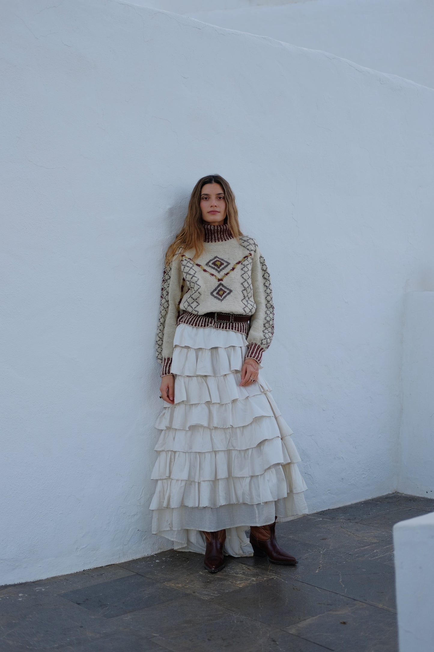 
                  
                    Handcrafted Himalayan wool jumper with puffed sleeves, turtleneck, and ribbed detailing, naturally dyed and handmade by female artisans in India.
                  
                