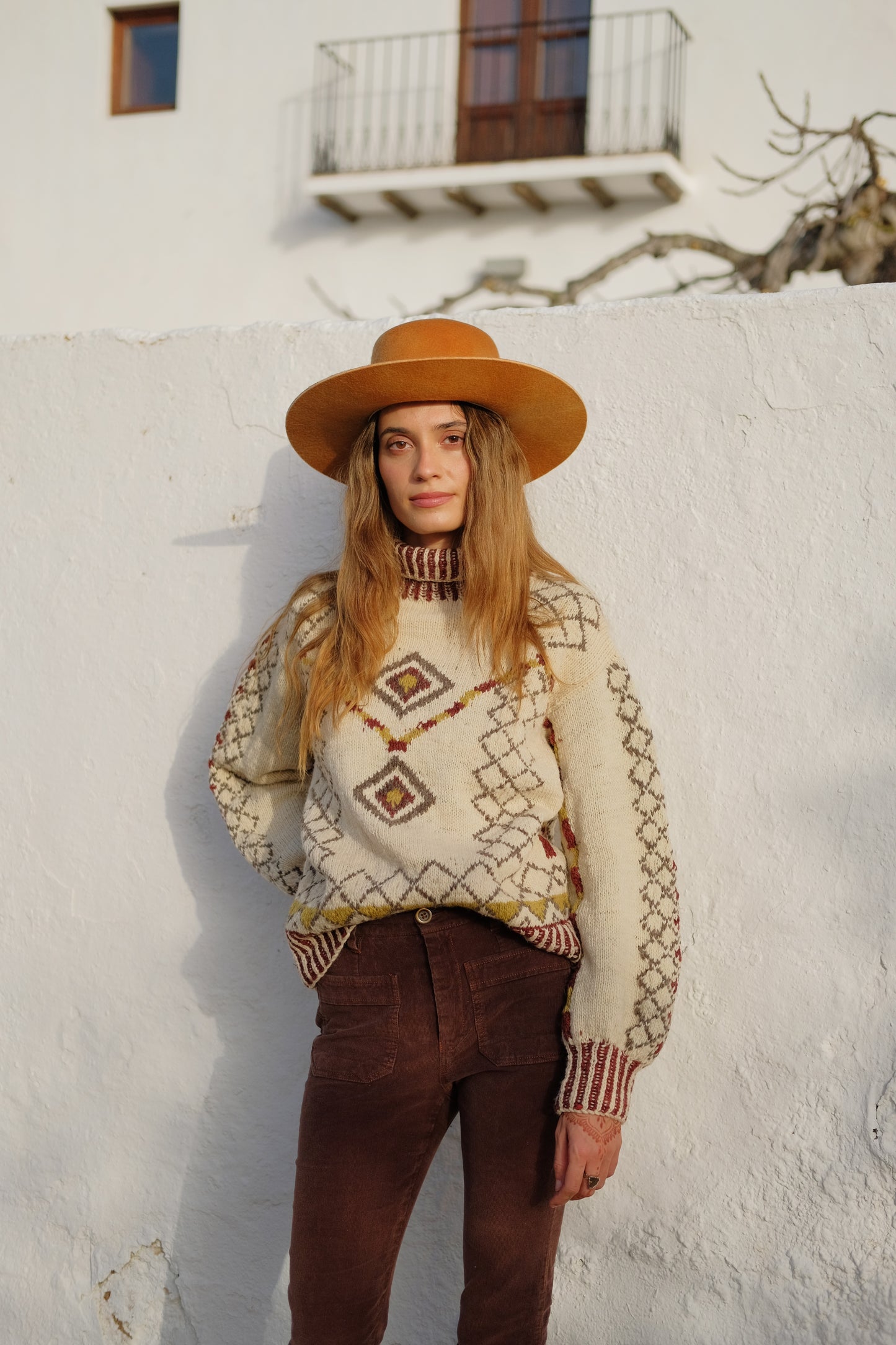 Handcrafted Himalayan wool jumper with puffed sleeves, turtleneck, and ribbed detailing, naturally dyed and handmade by female artisans in India.