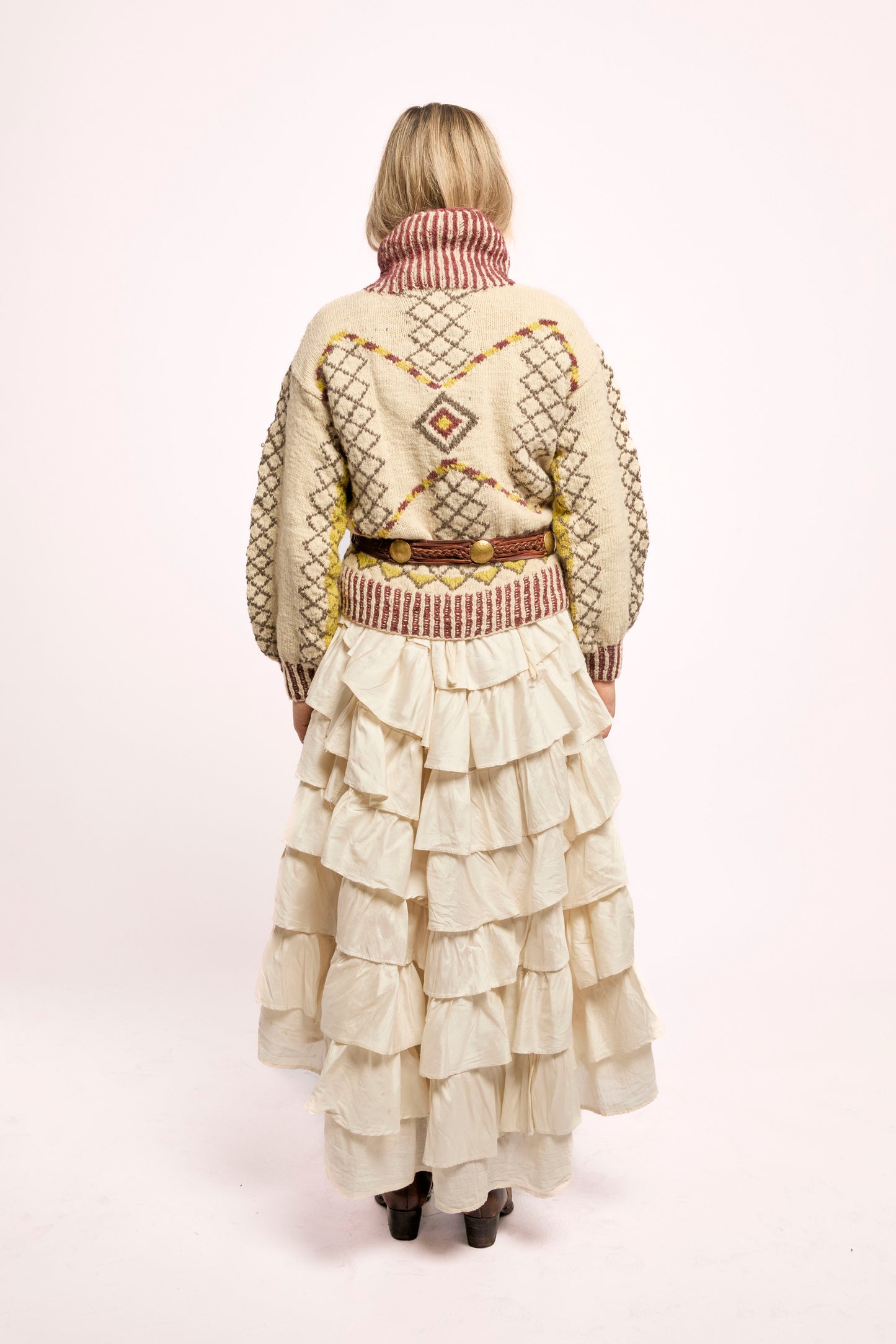 
                  
                    Handcrafted Himalayan wool jumper with puffed sleeves, turtleneck, and ribbed detailing, naturally dyed and handmade by female artisans in India.
                  
                