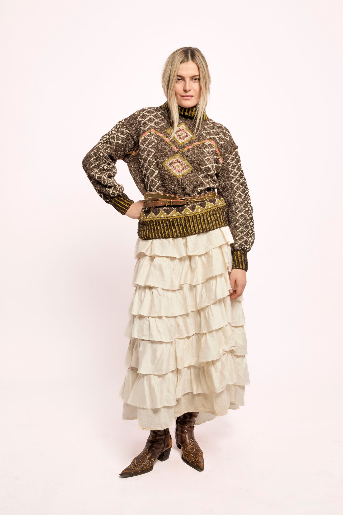 
                  
                    Handcrafted Himalayan wool jumper with puffed sleeves, turtleneck, and ribbed detailing, naturally dyed and handmade by female artisans in India.
                  
                