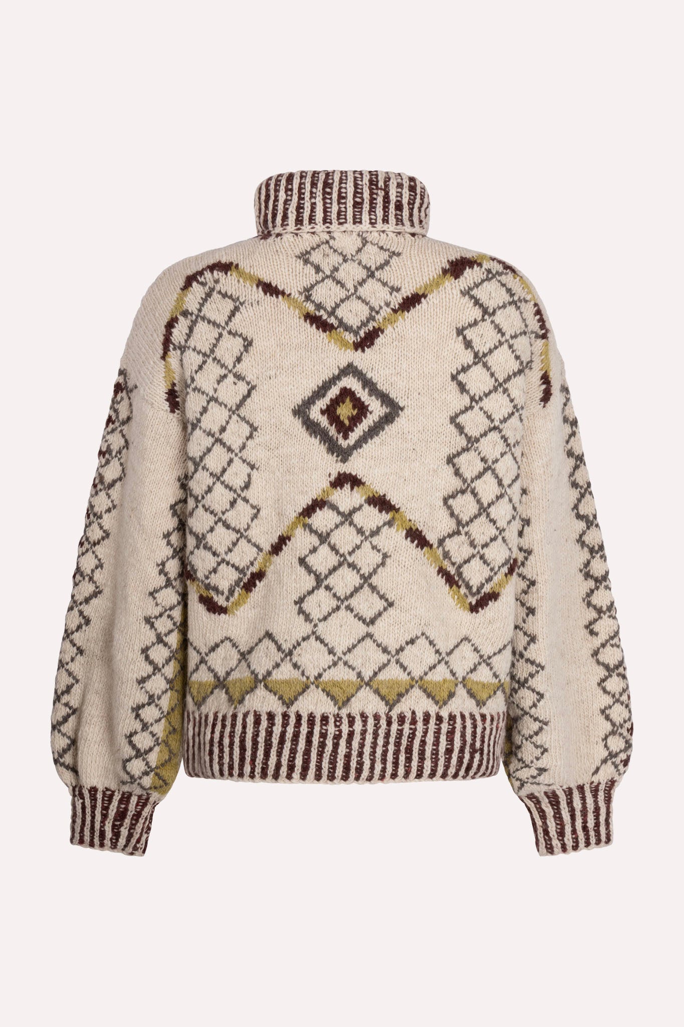 
                  
                    Handcrafted Himalayan wool jumper with puffed sleeves, turtleneck, and ribbed detailing, naturally dyed and handmade by female artisans in India.
                  
                