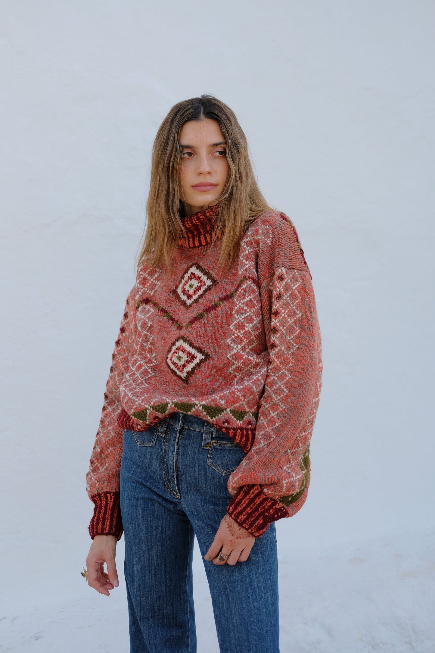 
                  
                    Handcrafted Himalayan wool jumper with puffed sleeves, turtleneck, and ribbed detailing, naturally dyed and handmade by female artisans in India.
                  
                