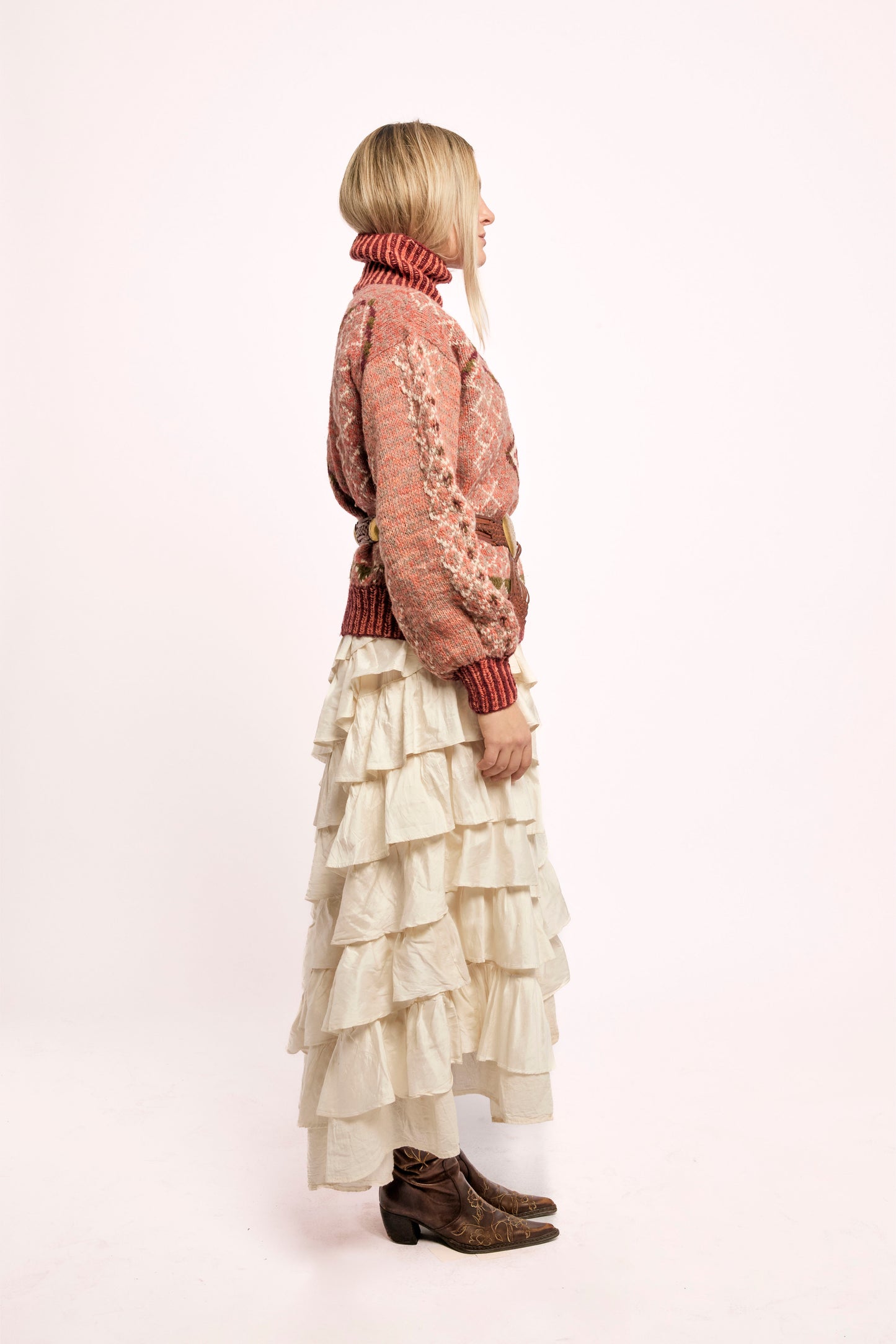 
                  
                    Handcrafted Himalayan wool jumper with puffed sleeves, turtleneck, and ribbed detailing, naturally dyed and handmade by female artisans in India.
                  
                