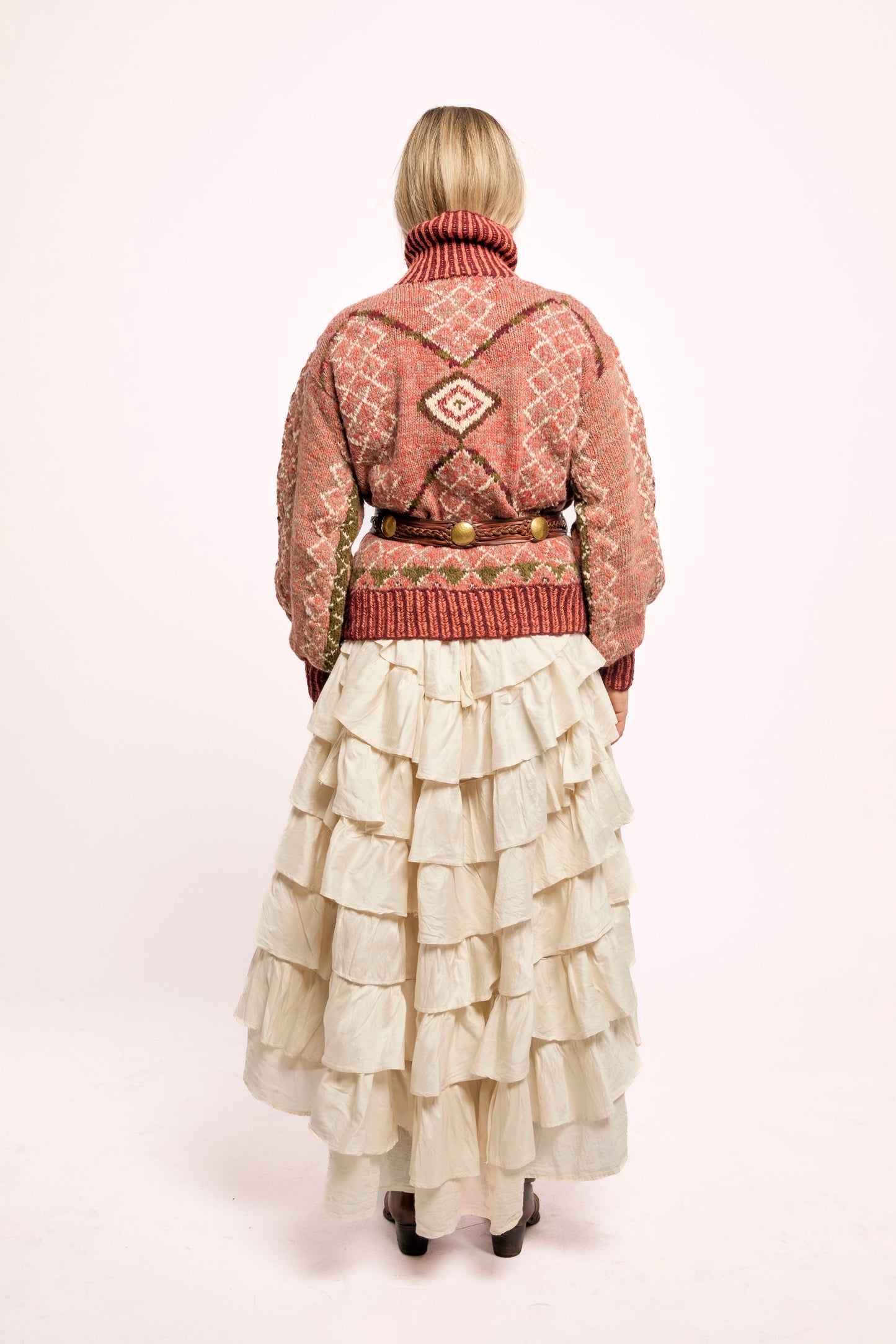 
                  
                    Handcrafted Himalayan wool jumper with puffed sleeves, turtleneck, and ribbed detailing, naturally dyed and handmade by female artisans in India.
                  
                