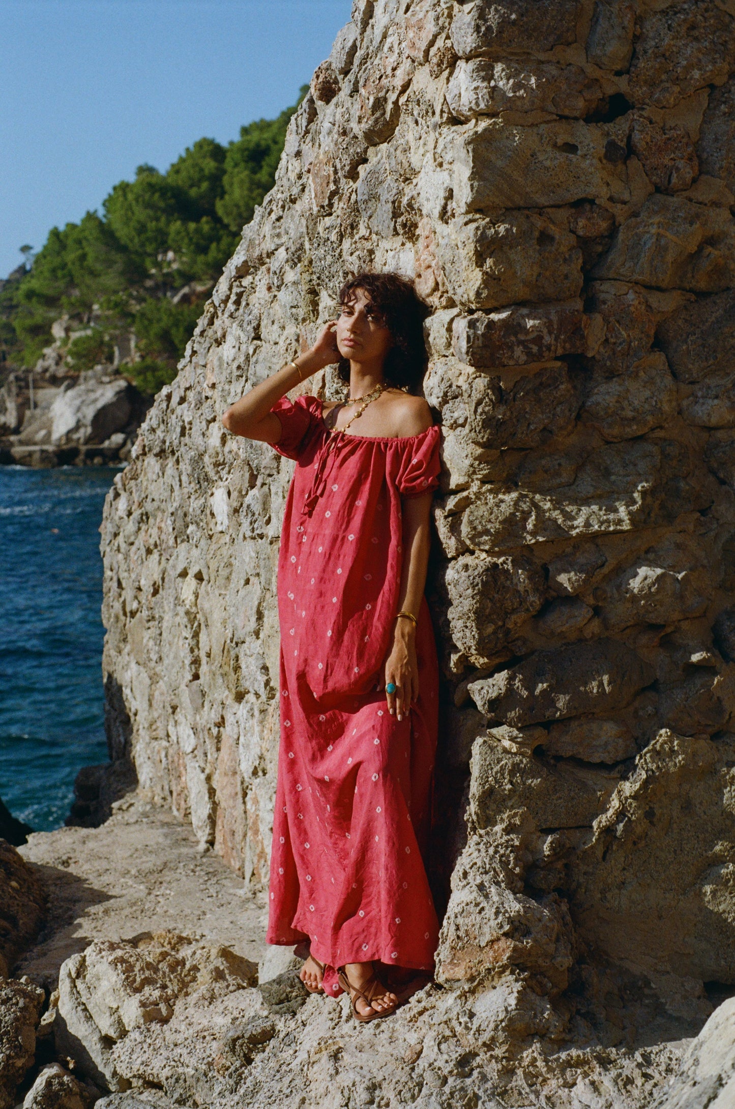 ZAZI Pathani Dress featuring a naturally dyed and eco-printed off-shoulder maxi silhouette with a flowing bohemian design and artisan craftsmanship.