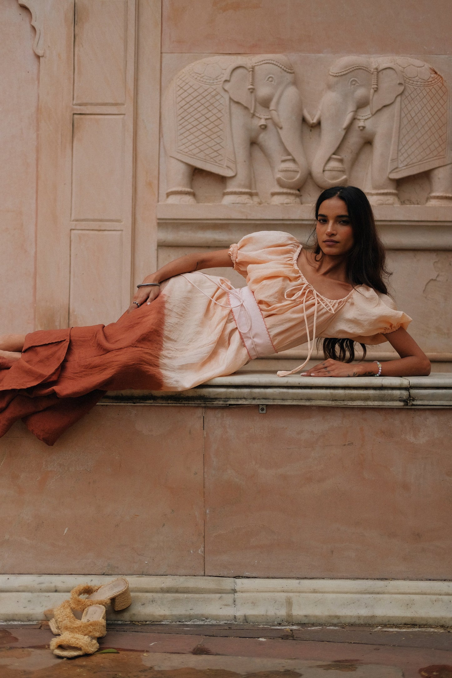 
                  
                    ZAZI Pathani Dress featuring a naturally dyed and eco-printed off-shoulder maxi silhouette with a flowing bohemian design and artisan craftsmanship.
                  
                
