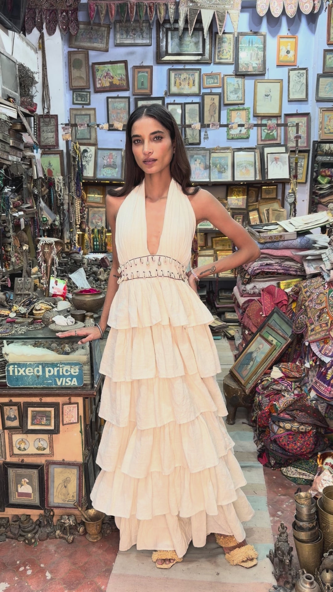 
                  
                    Load and play video in Gallery viewer, Women&amp;#39;s Salila maxi dress crafted from 100% Khadi cotton with a halter neck, flowing ruffles, shell embellishments, and adjustable open-back design.
                  
                