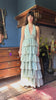 ZAZI Women's Salila maxi dress crafted from 100% mulberry silk with a halter neck, flowing ruffles, shell embellishments, and adjustable open-back design.