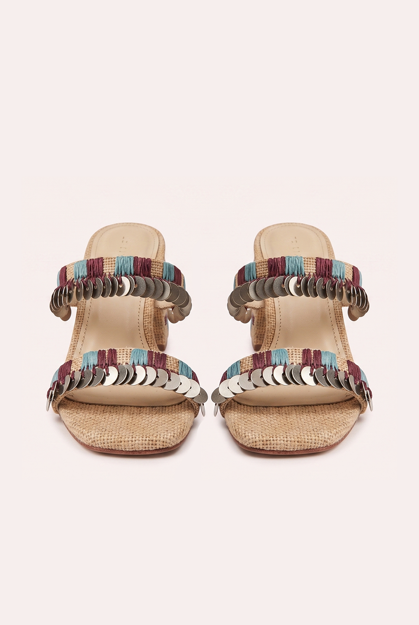 Textured toile de jute block heel sandals with intricate raffia embroidery and metal plate beads.