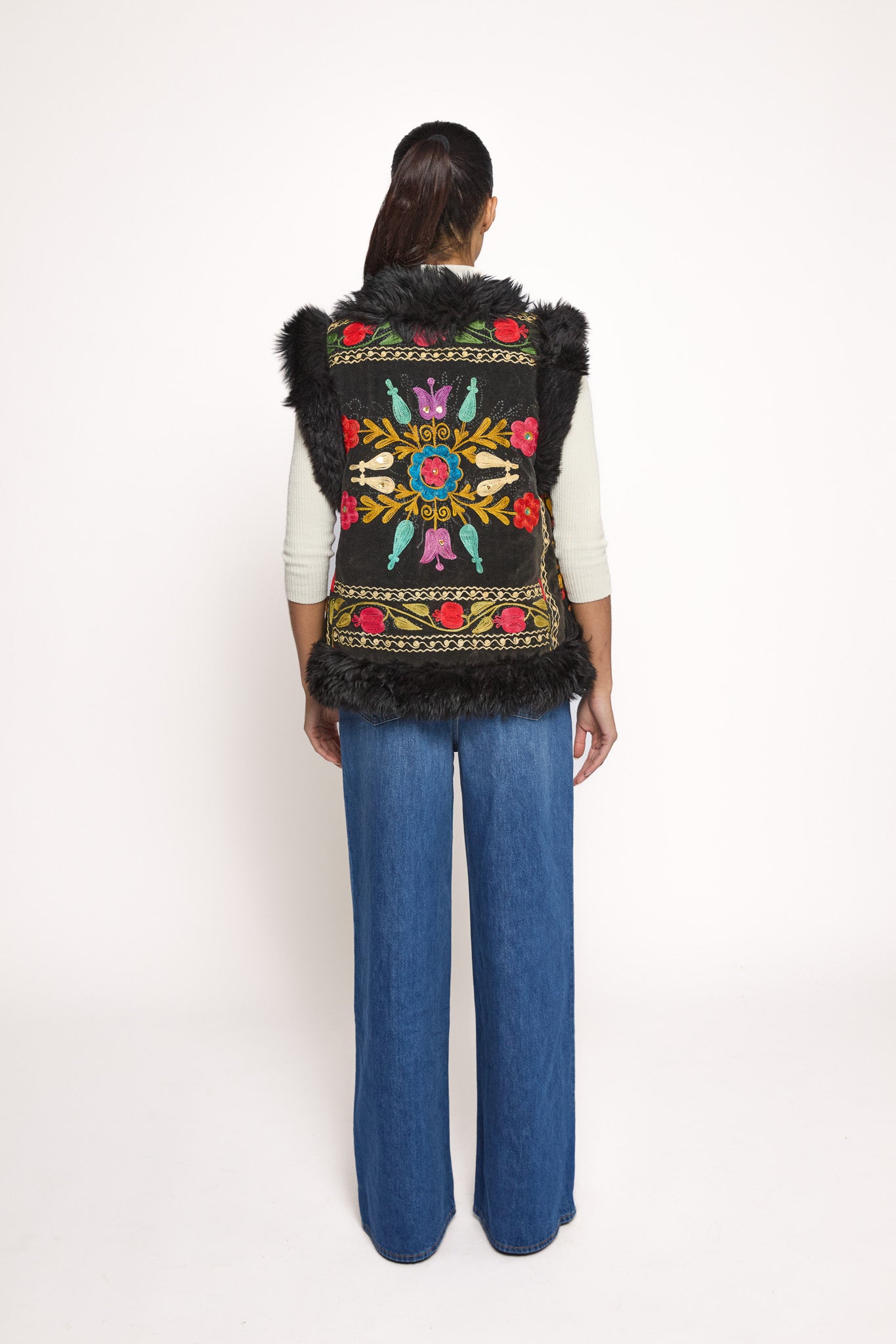 Black ZAZI waistcoat with bright flower pattern and black trim ethically handmade with vintage suzani 