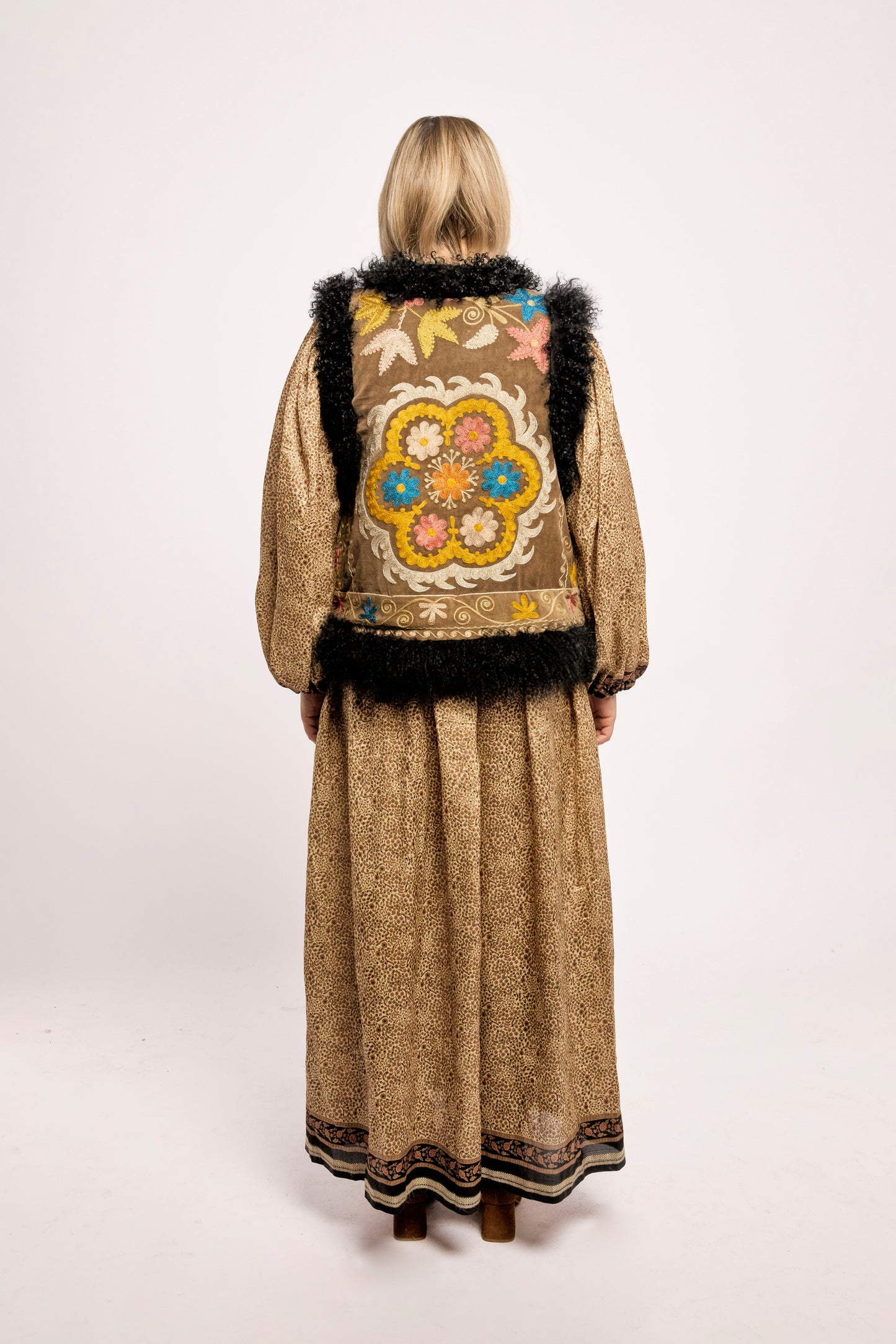 
                  
                    Brown velvet ZAZI waistcoat with black trim ethically handmade with vintage suzani embroidery
                  
                